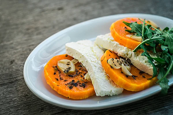 Baked and juicy slices of pumpkin — Stock Photo, Image