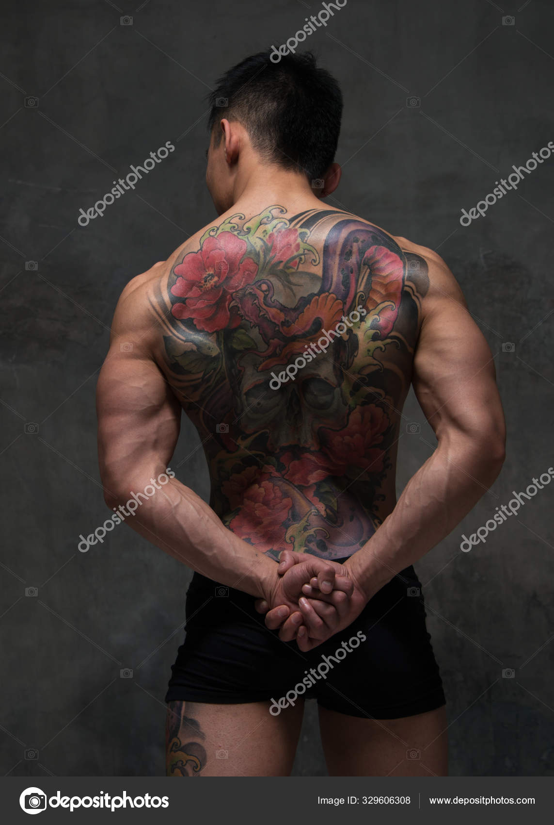 Asian model with tattoo Stock Photo by ©vishstudio 329606308