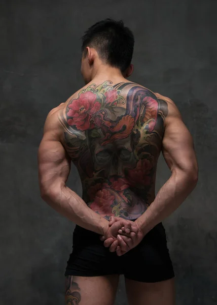 Asian model with tattoo