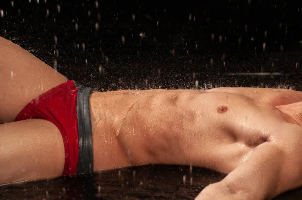 Muscled Male Model Water Drops Royalty Free Stock Photos