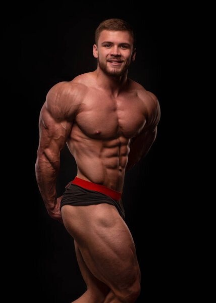 Fitness male model in studio