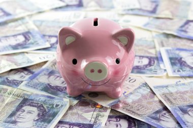 Pound sterling ile Piggy banka