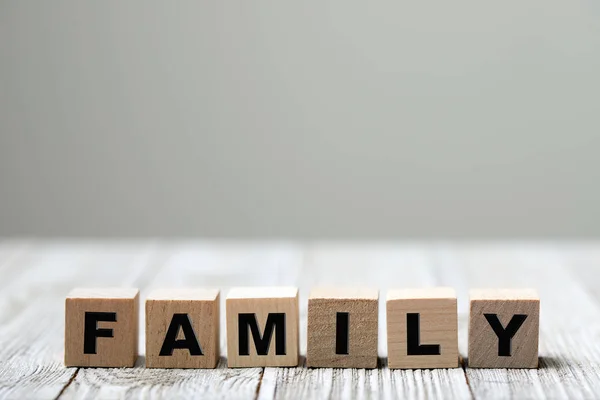 Family word written on wood block — Stock Photo, Image