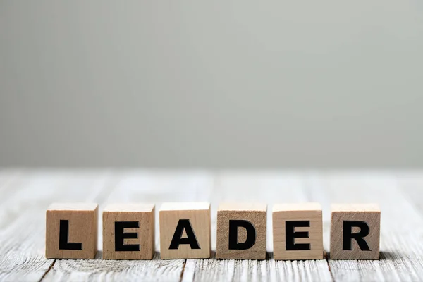 Leader word written on wood block — Stock Photo, Image