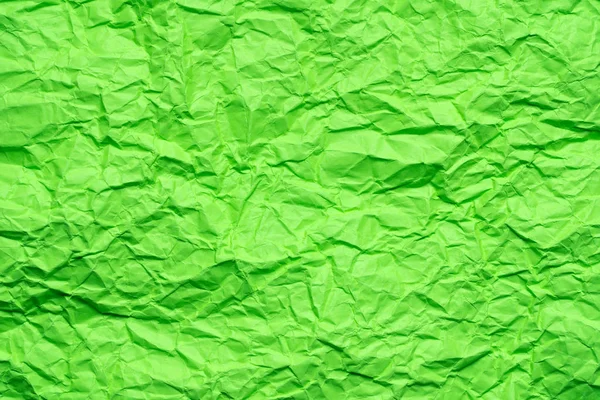 Green crumpled paper background — Stock Photo, Image