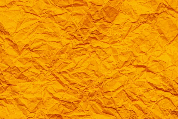 Orange zerknülltes Papier Hintergrund — Stockfoto