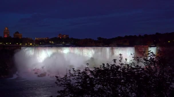 American Falls lit by light at night, Niagara Falls, Ontario, Canada — 图库视频影像