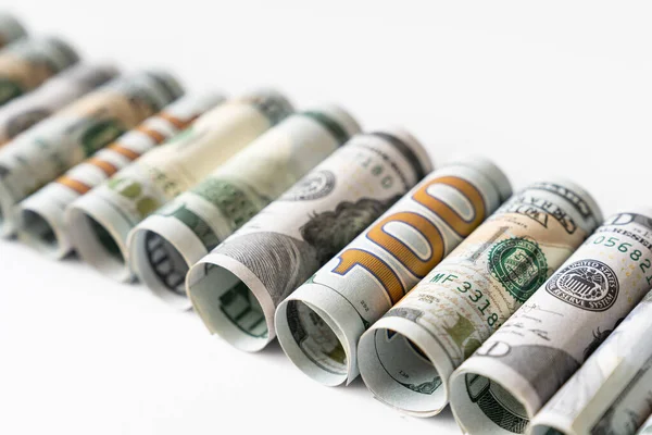 Rolls of US dollar bill in a row — Foto de Stock