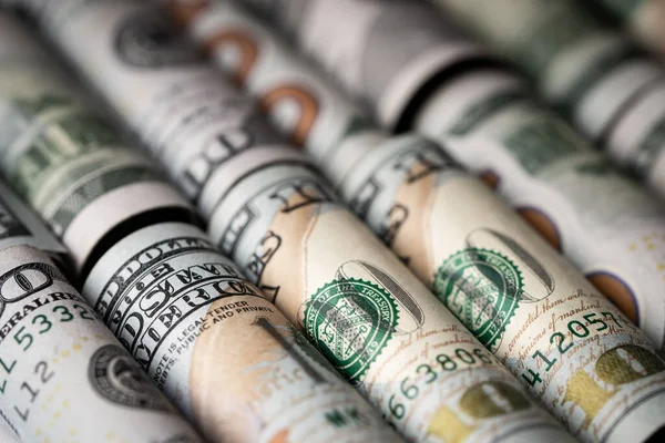 Rolls of US dollar bill in a row — Stock Photo, Image