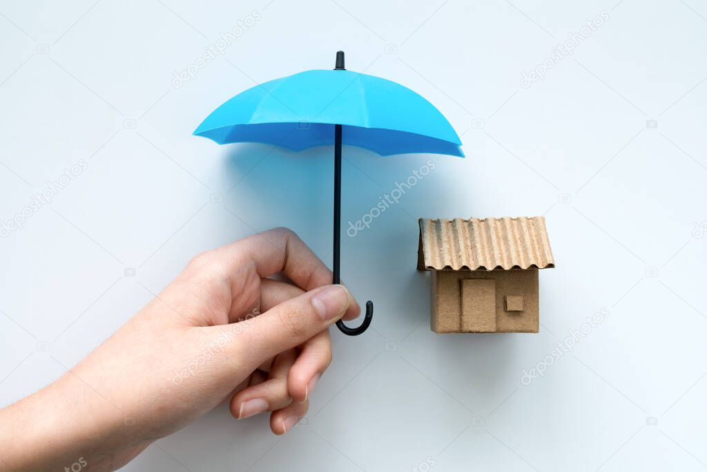 House under blue color umbrella