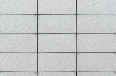 Duvar dış yüzey panelleri ile kaplı. Mimari arka plan.