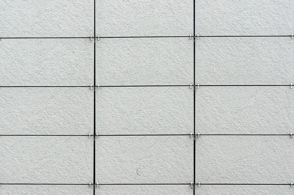 Wand mit Platten beschichtet. architektonische Hintergründe. — Stockfoto