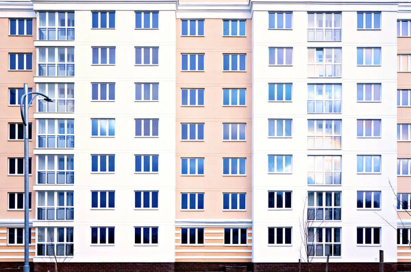 Facade of modern high-rise apartment building.
