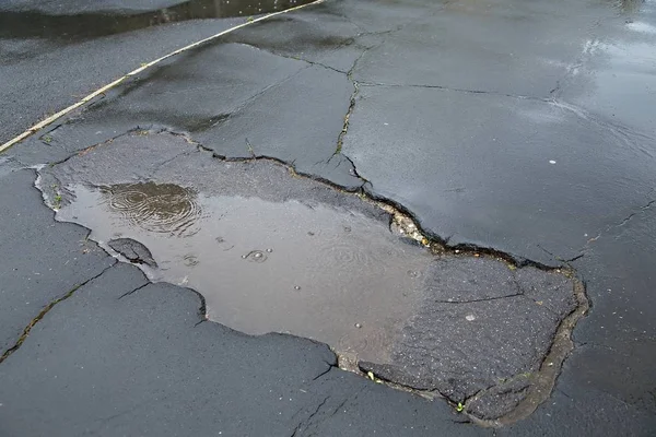 Potholes in Rain — Stock Photo, Image