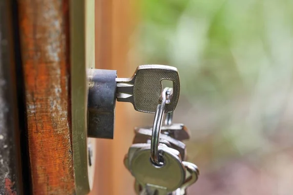 Open garden gate with key — Stock Photo, Image