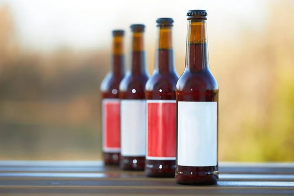 Beer bottles on a table — Stock Photo, Image