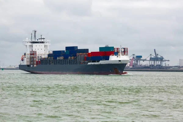 Ship carrying containers through Rotterdam — Stock Photo, Image