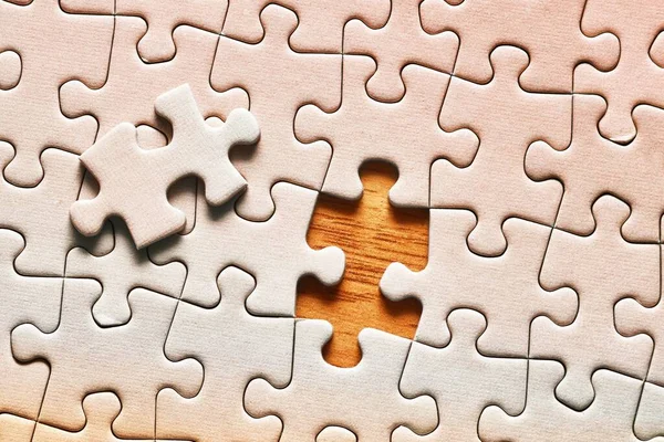 Jigsaw puzzle background, almost done — Stock Photo, Image