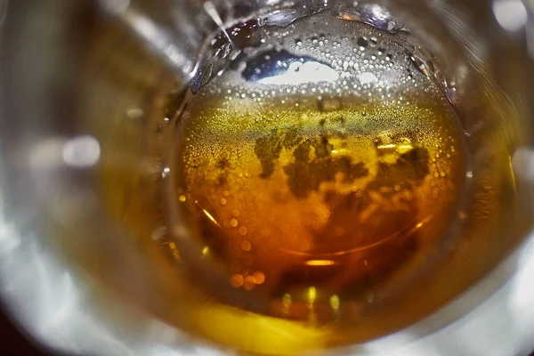 Drinking beer closeup inside the pint glass — Stock Photo, Image