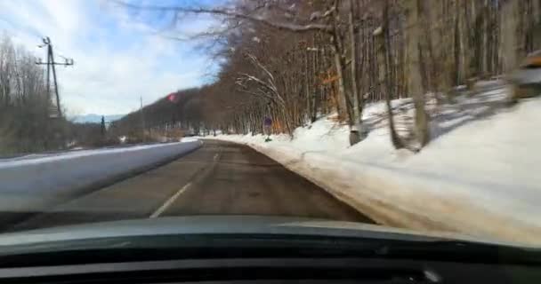 Driving a car, snowy landscape — Stock Video