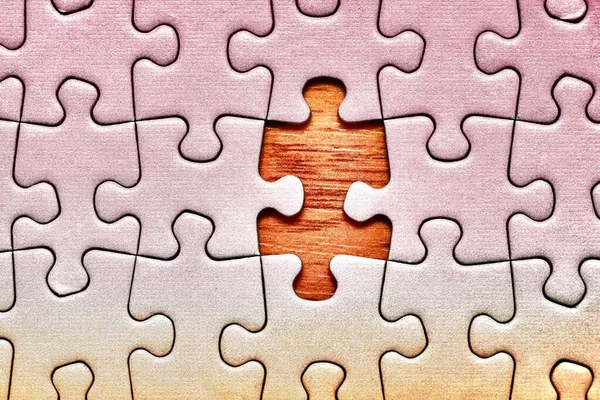 Jigsaw puzzle background, almost done — Stock Photo, Image