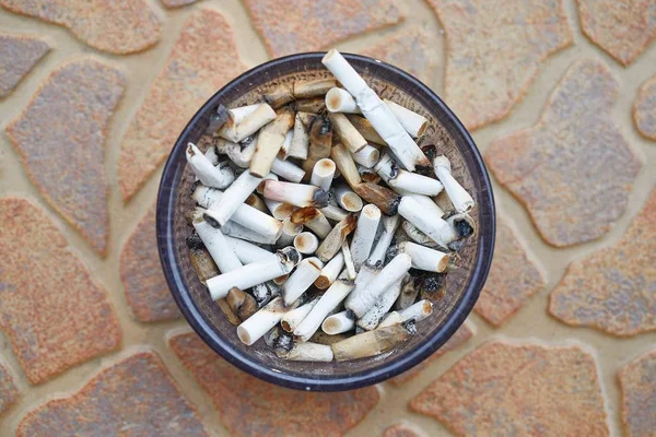 Cigarette buts in an ashtray — Stock Photo, Image