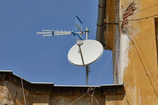 Rooftop Parabola Satellite Receivers Royalty Free Stock Photos