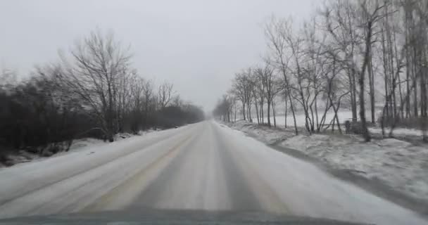 Conducir en la nieve — Vídeo de stock
