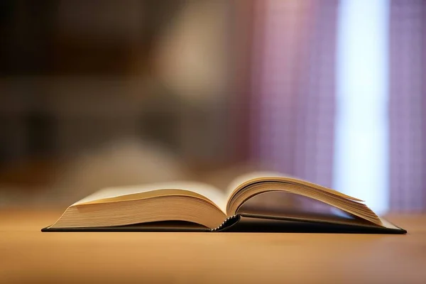 Book in a table in a room — Stock Photo, Image