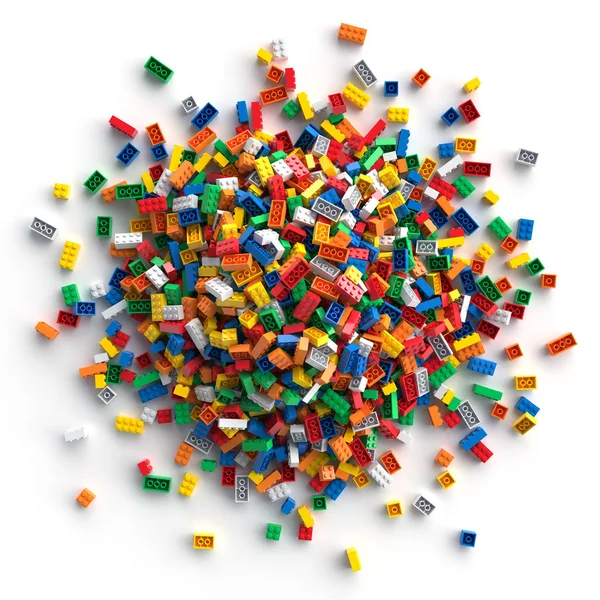 Pile of colored toy bricks isolated on white background. — Stock Photo, Image