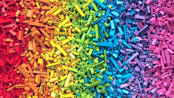 Lot of colorful rainbow toy bricks background — Stock Photo, Image