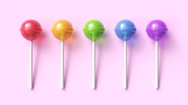 Set of five colorful sweet lollipops on pink pastel background clipart