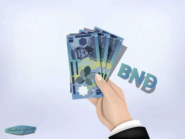 Brunei dollár pénz papír kéznél, a készpénz a kezét — Stock Vector