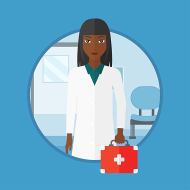 İlk yardım kutusu vektör illüstrasyon ile Doktor.