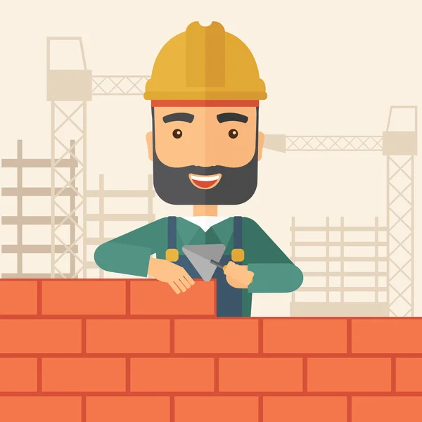 Builder man construit un mur de briques . — Photo