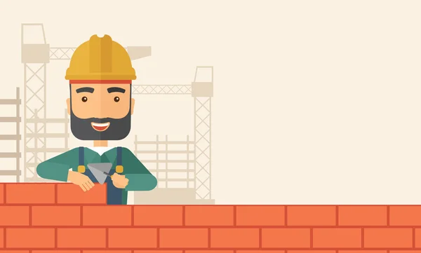 Οικοδόμος άνθρωπος χτίζει έναν τοίχο από τούβλα. — Φωτογραφία Αρχείου