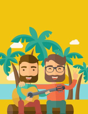 Two men playing a guitar at the beach