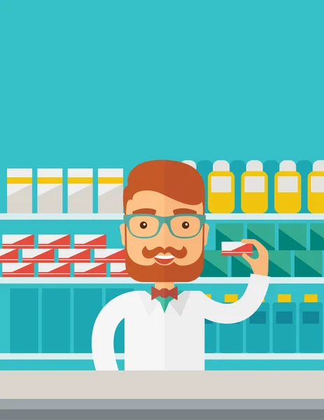 Young  pharmacy chemist man standing in drugstore. — Zdjęcie stockowe