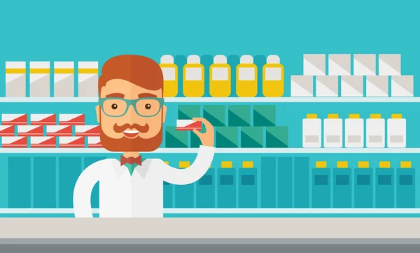 Young  pharmacy chemist man standing in drugstore. — Stockfoto