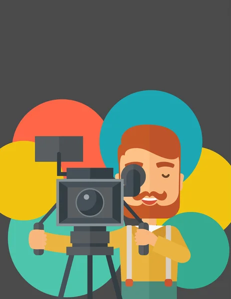 Videographer and his video cam with stand. — Stock fotografie