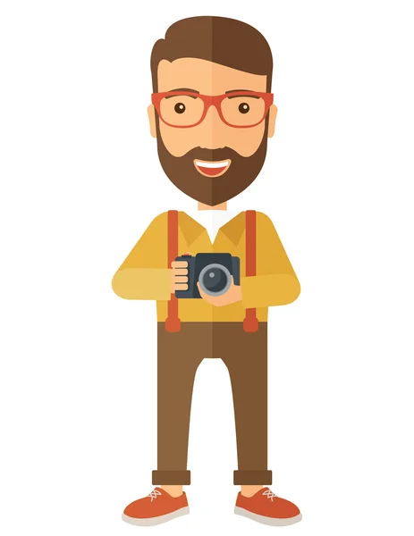 Fotograf drží svůj fotoaparát — Stock fotografie