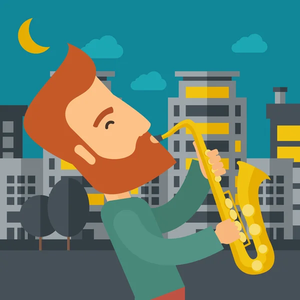 Saxophonist playing in the streets at night — Stok fotoğraf