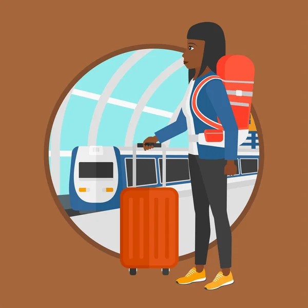 Mujer en la estación de tren . — Vector de stock