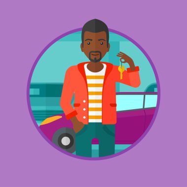 Yeni arabasının anahtarları tutan adam.