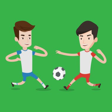 İki erkek futbol oyuncuları top için mücadele.