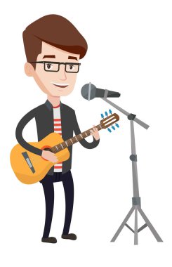 Adam mikrofon şarkı ve gitar çalmak.