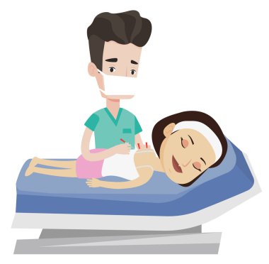 Akupunktur Uzmanı Doktor yapma akupunktur tedavisi.