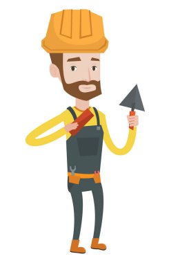 Duvarcı ustası spatula ve tuğla ile çalışma.