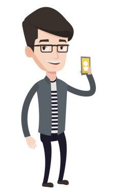 Adam holding zil cep telefonu.