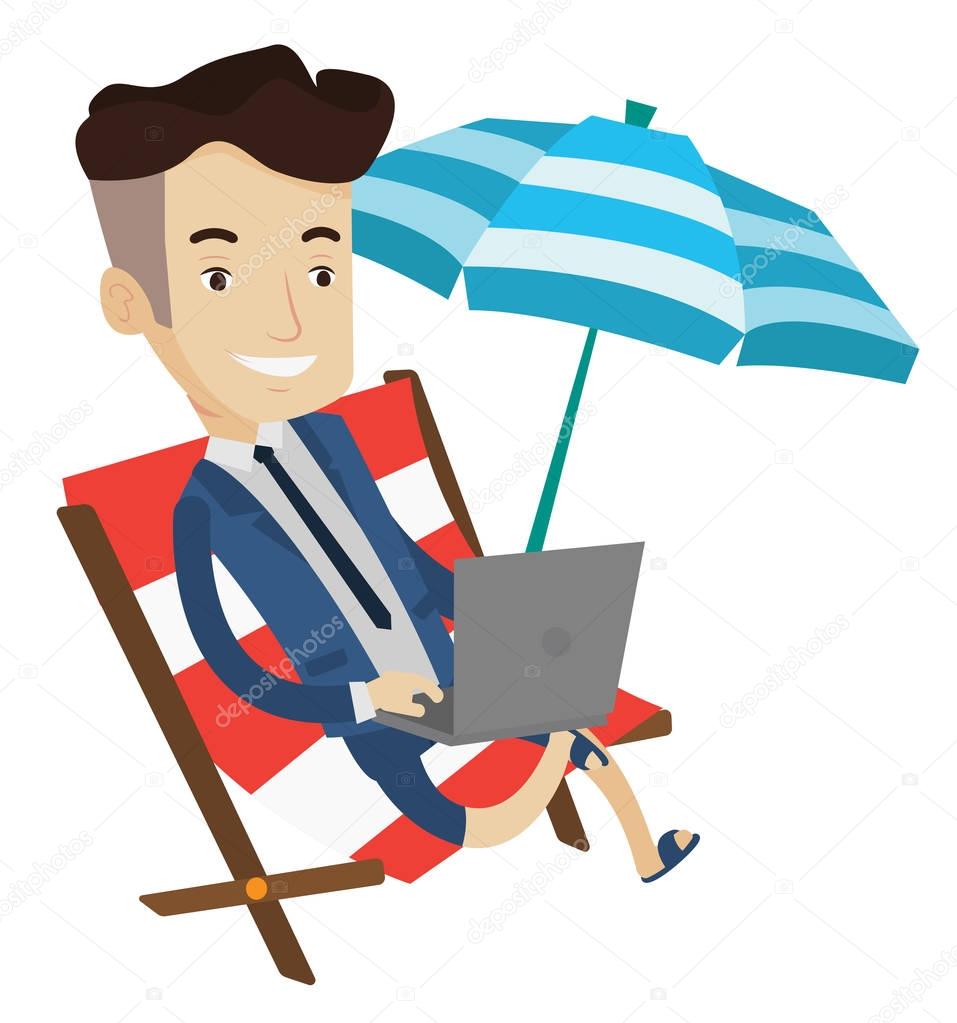 Businessman working with laptop on the beach.